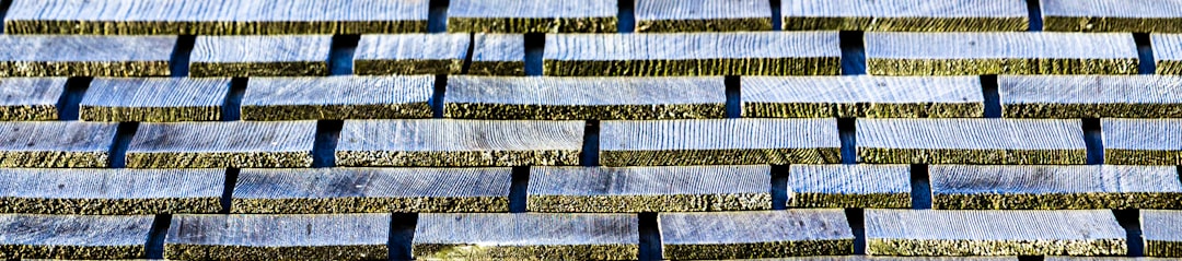 Weathered Wooden Roof Shingles Weathered wooden roof shingles with dark gaps.