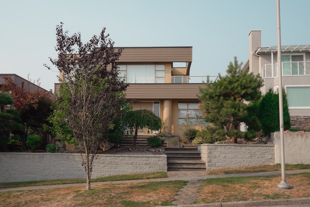 a house with a lot of windows and stairs