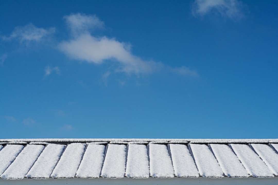 gray roof under blue sky during daytime