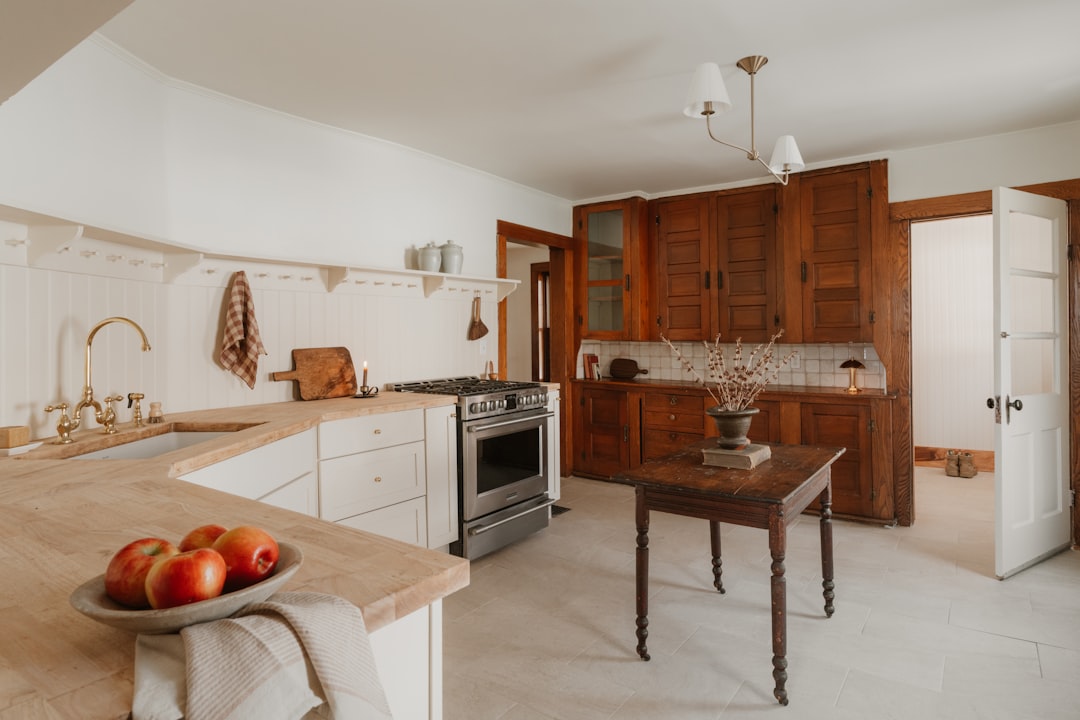 Rustic Kitchen Design A rustic kitchen with wooden cabinets and a stove.