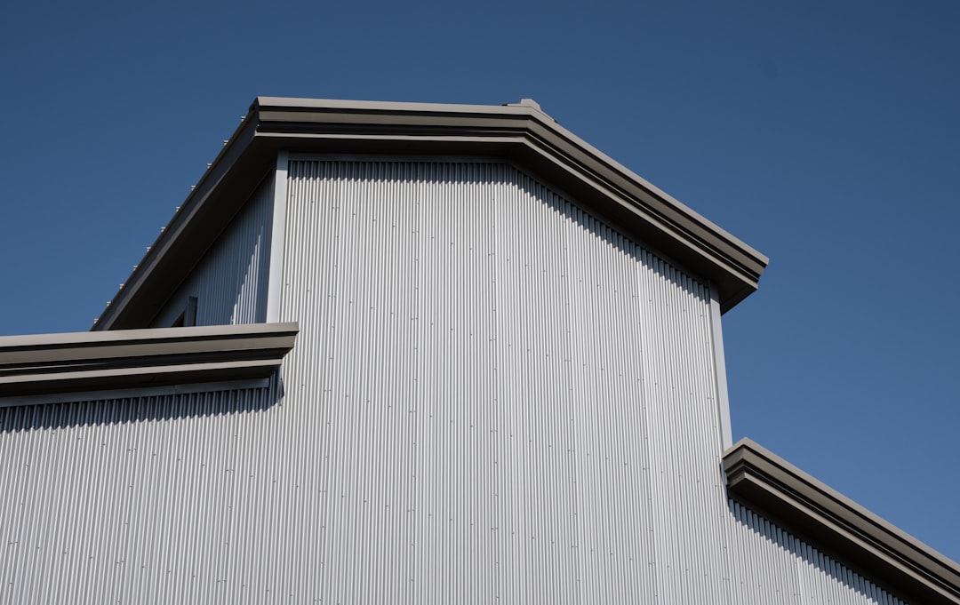 Metal-Clad Building Exterior white and brown wooden house