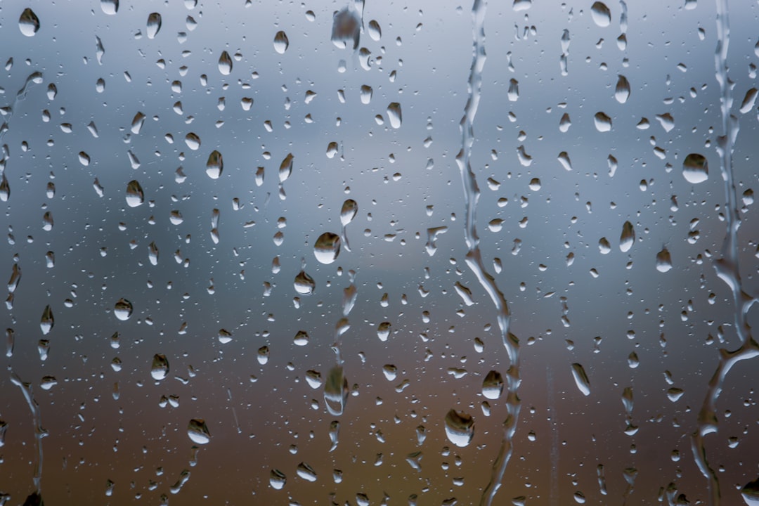 a window with rain drops on it