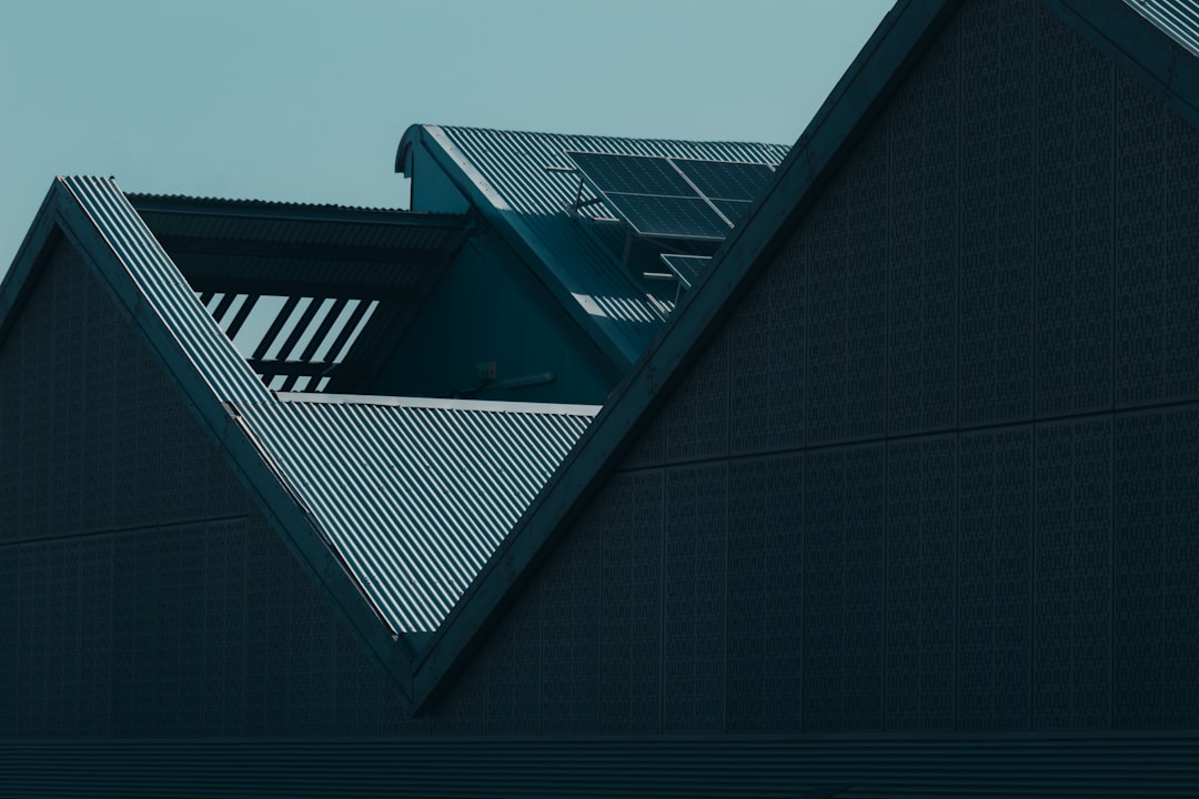 the roof of a building with a clock on it