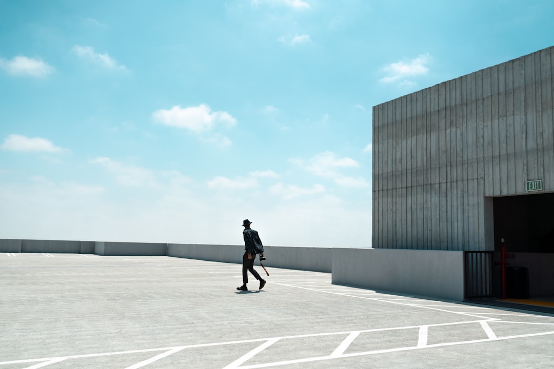 2f830f629eec41b1ae8694a6aa65973a person walking on rooftop