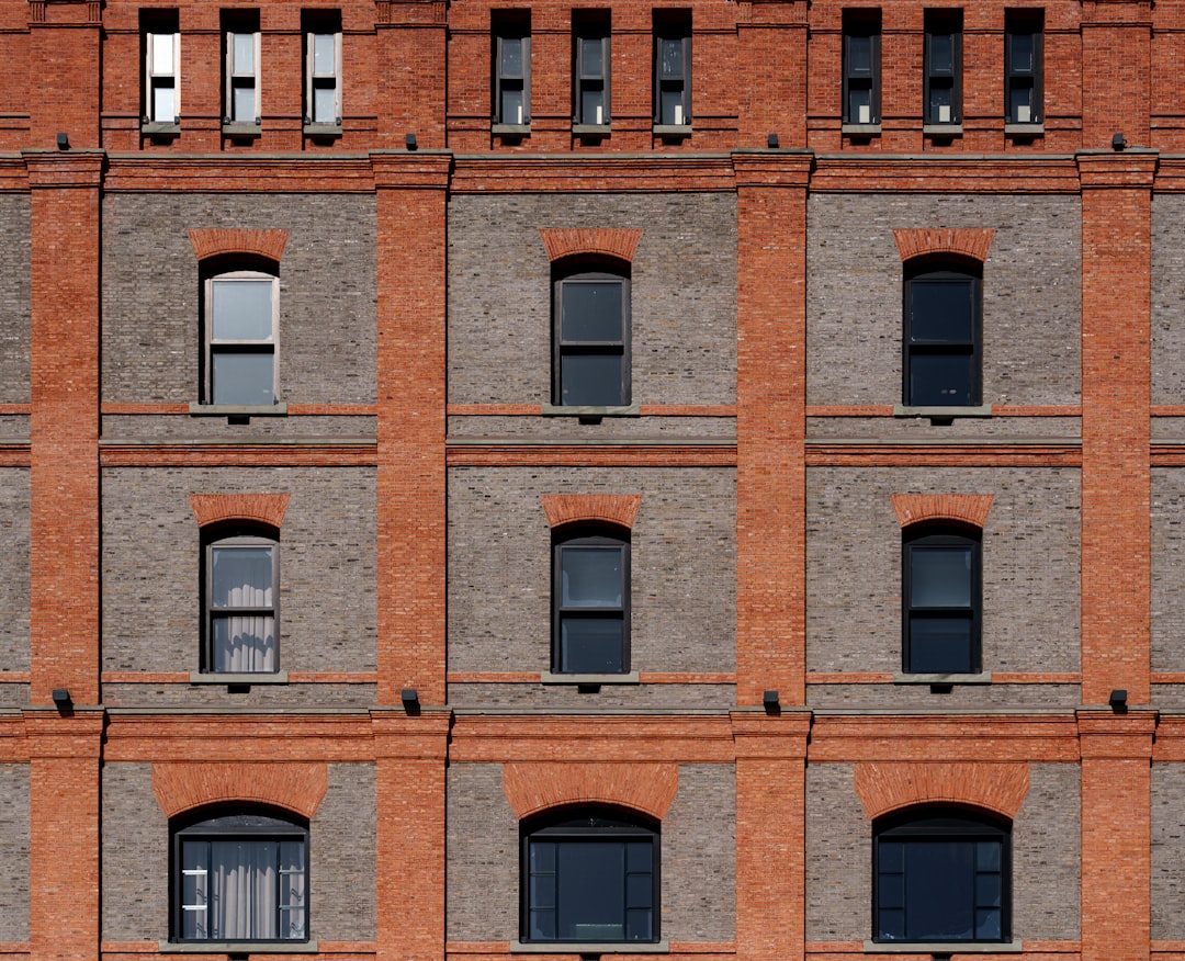 Brick building facade with multiple windows