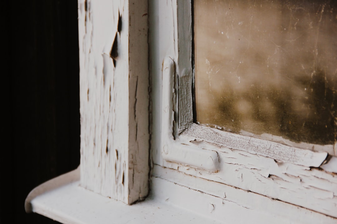 Old Wooden Window Frame a window with snow on it