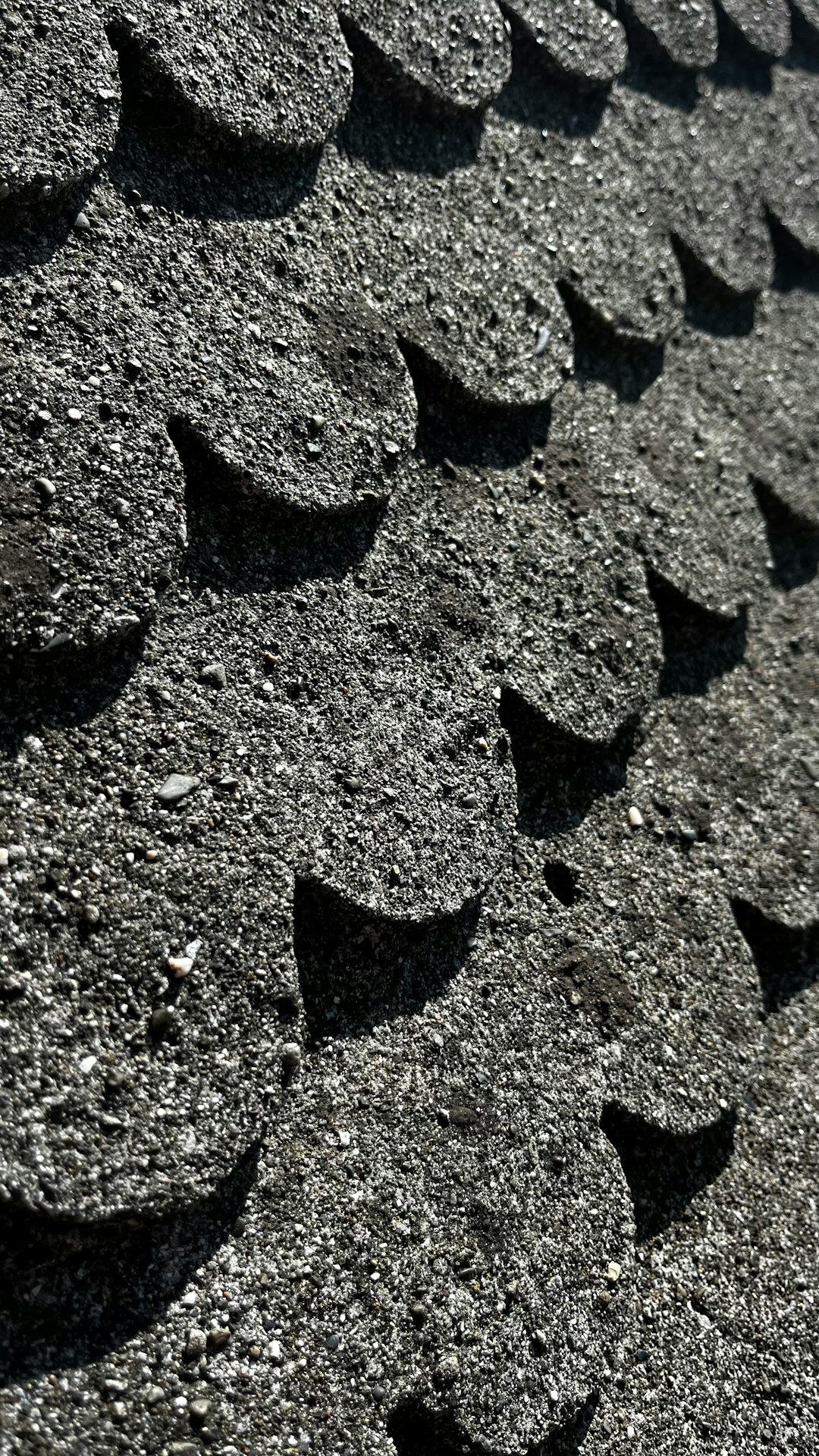 a close up of a roof made of rocks