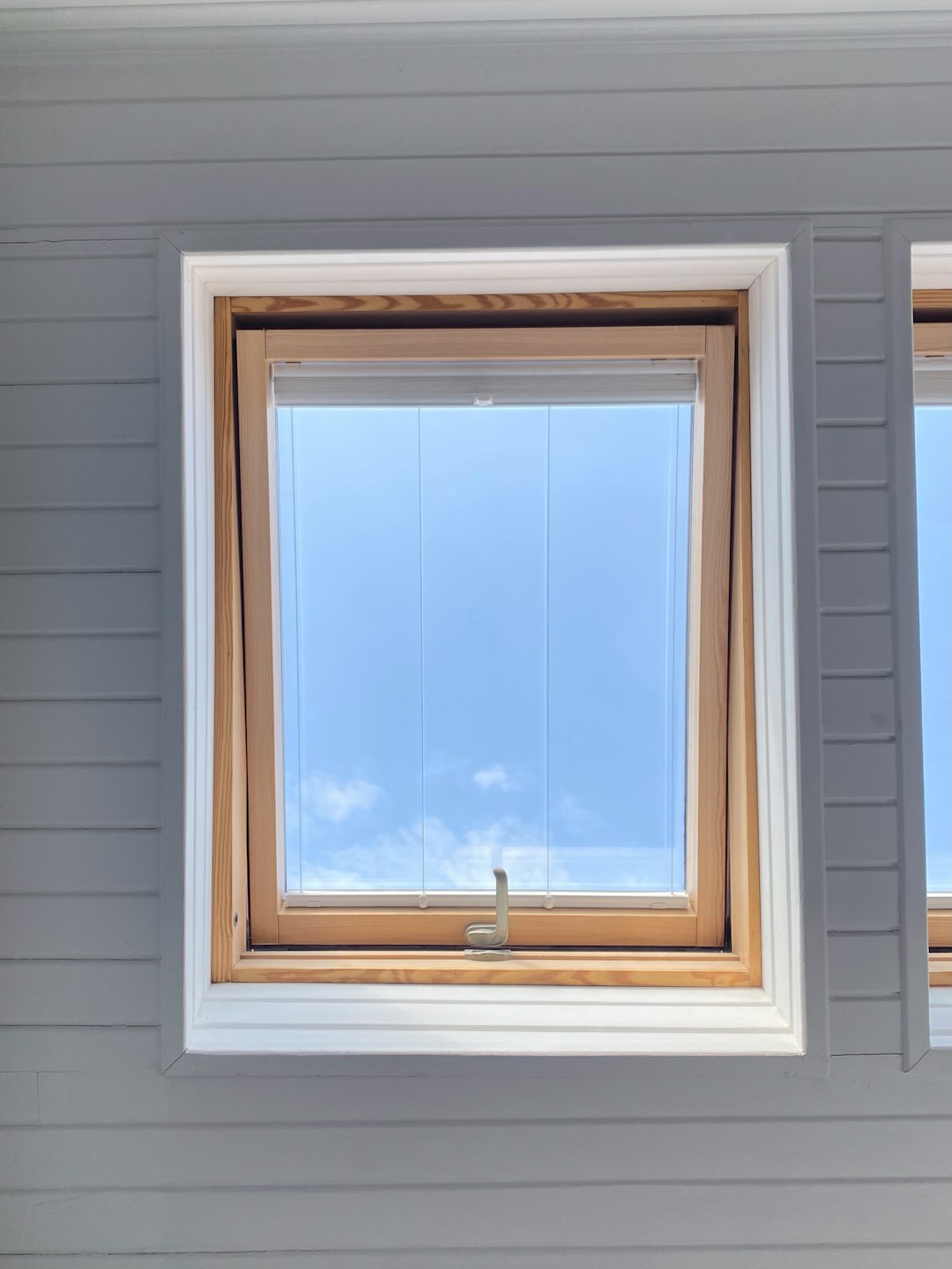 white wooden framed glass window