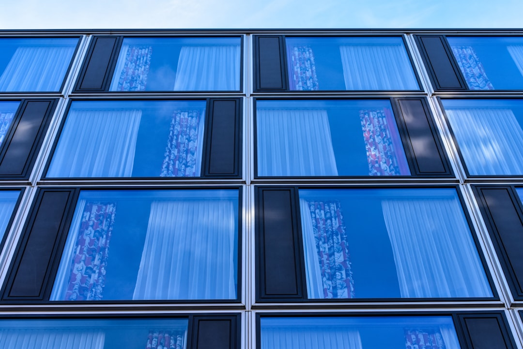 Modern building facade with blue glass windows