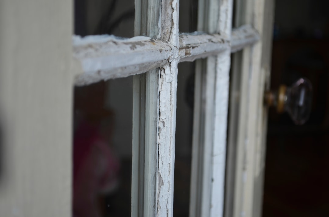 white wooden framed glass window
