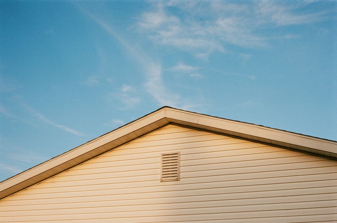 white wooden house under blue sky during daytime