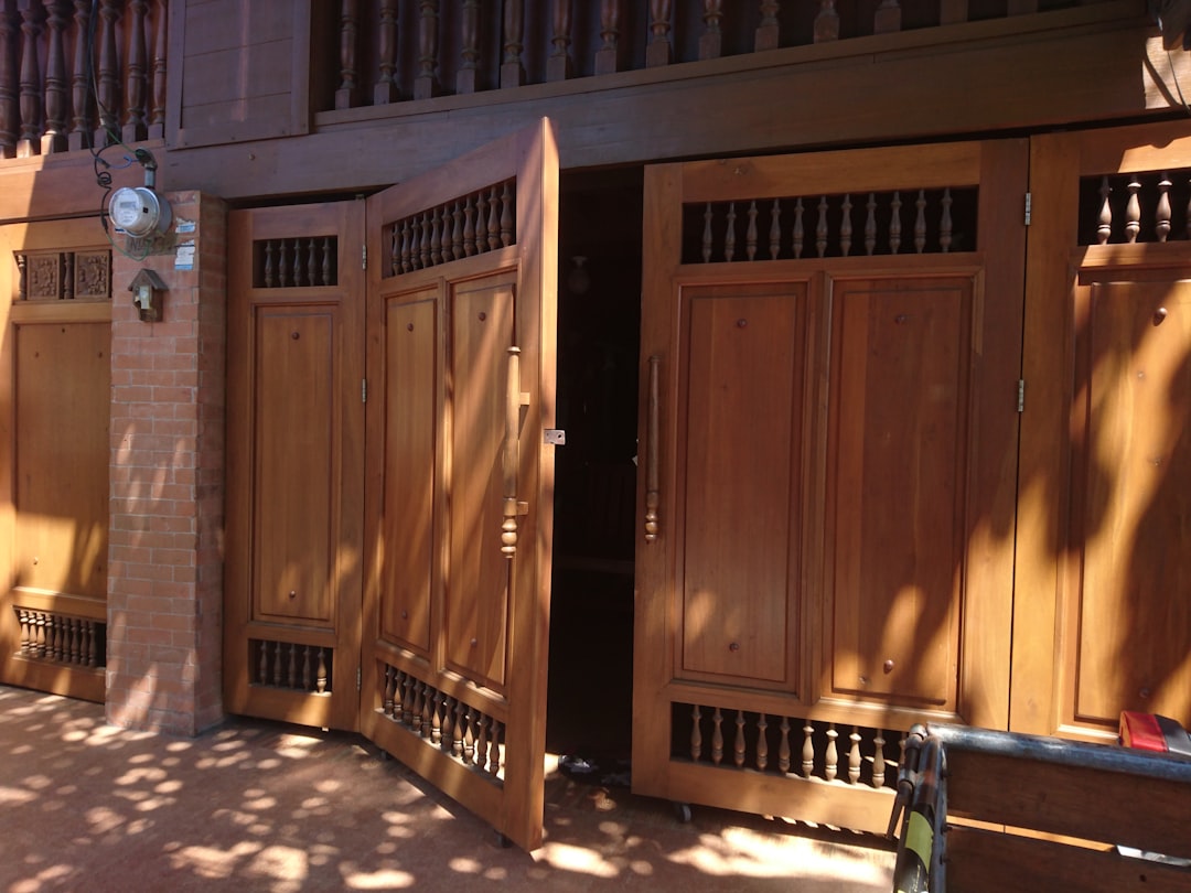 a couple of wooden doors sitting next to each other