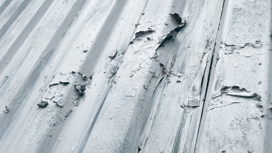 white snow on gray concrete wall