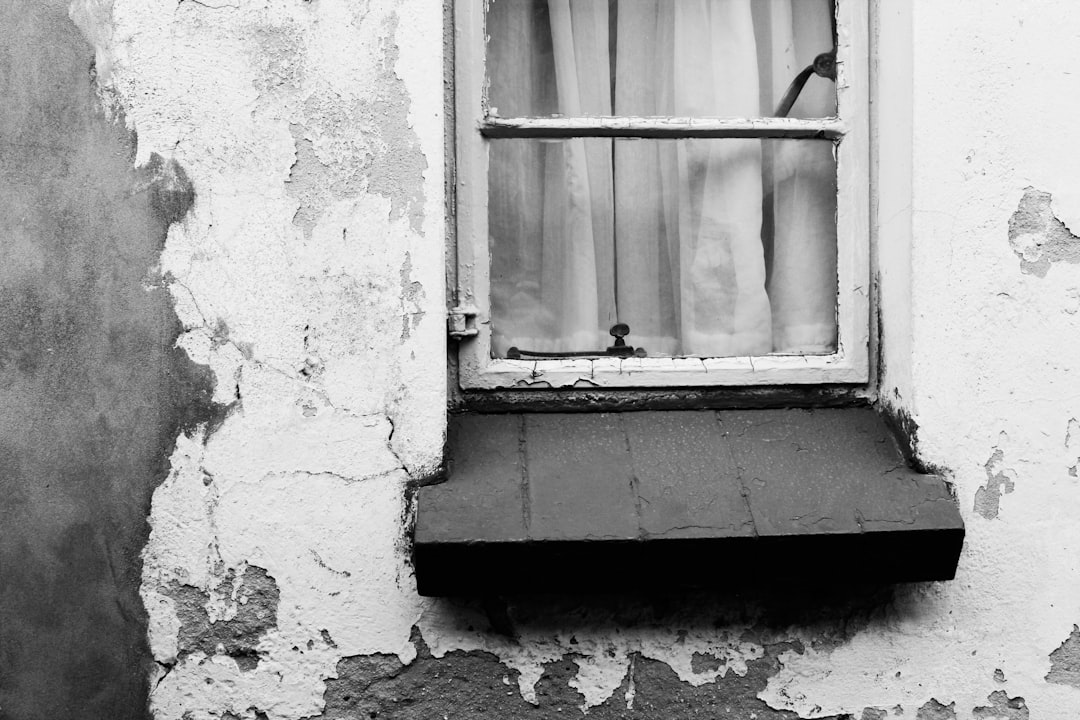 white wooden framed glass window