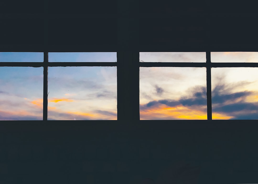 9ff4485145764da7a77000b8bf35e0a7 silhouette of window during sunset