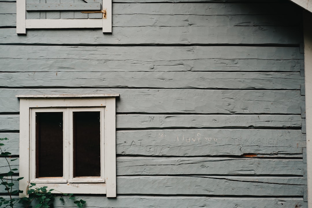 white wooden window frame on white wooden wall