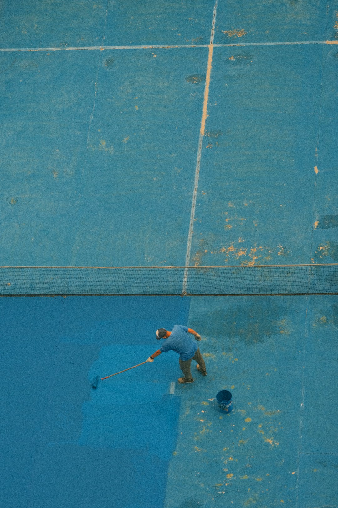 a man with a tennis racquet on a tennis court