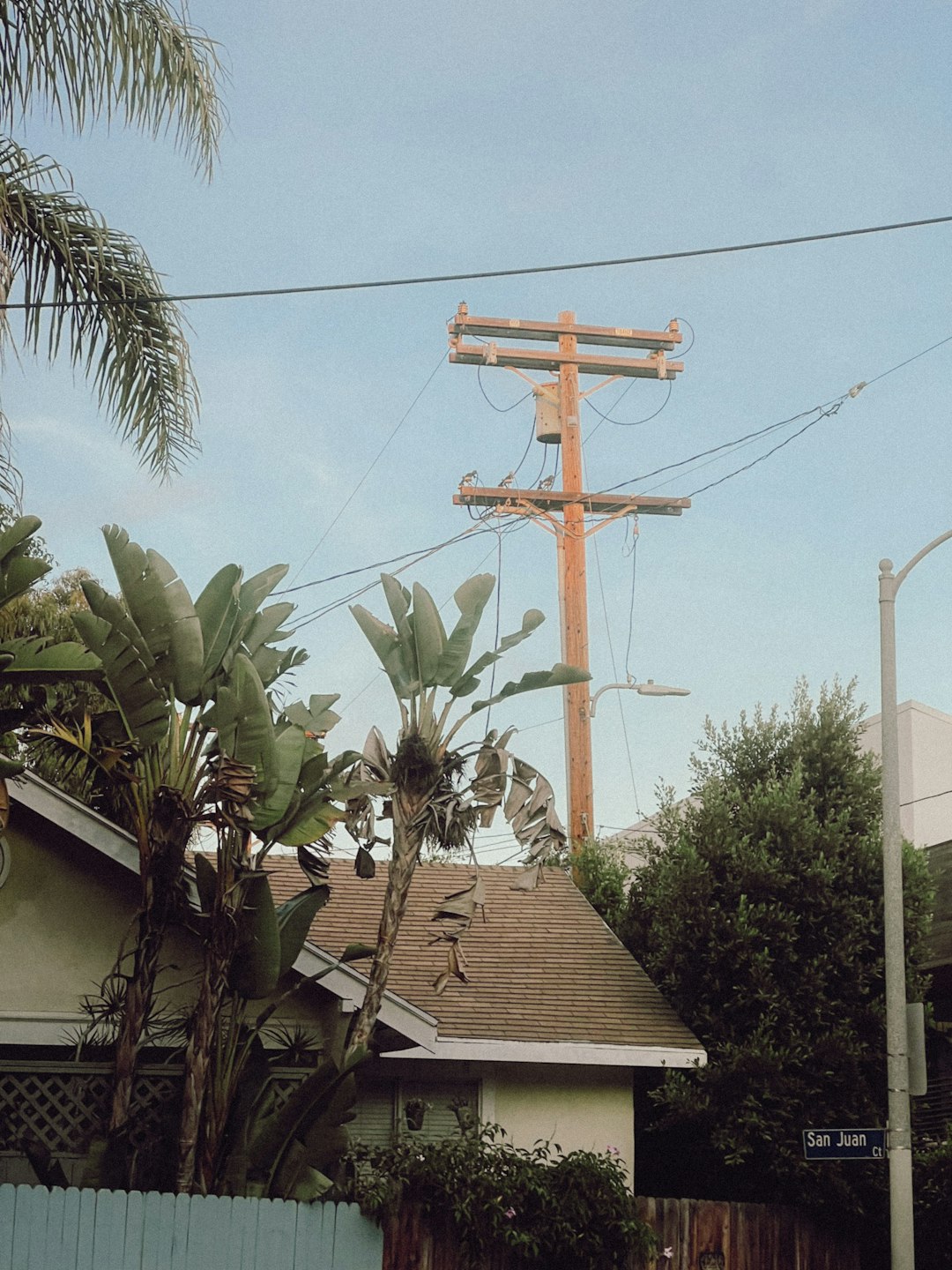 a house with a power line above it