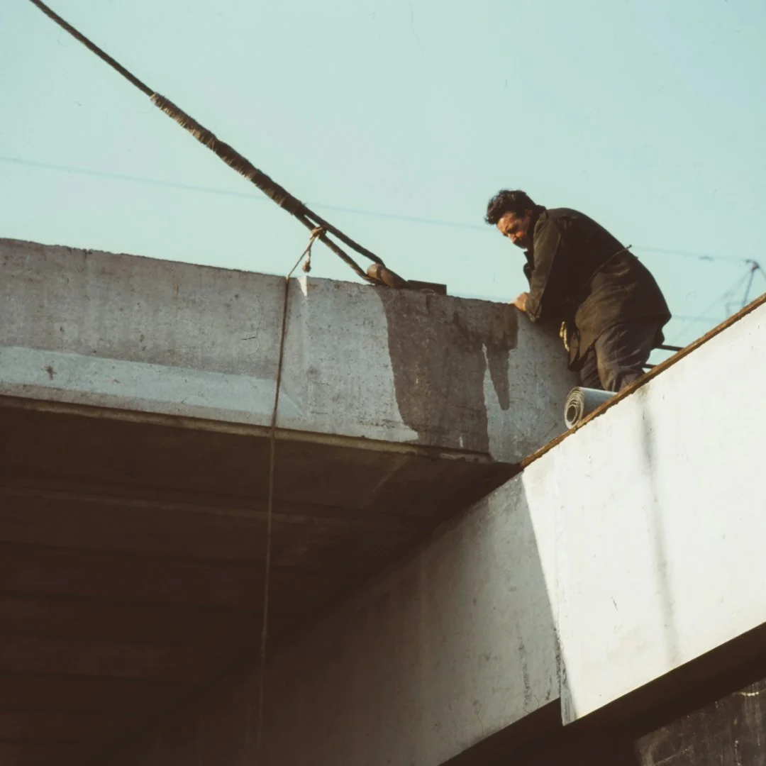 man on building rood
