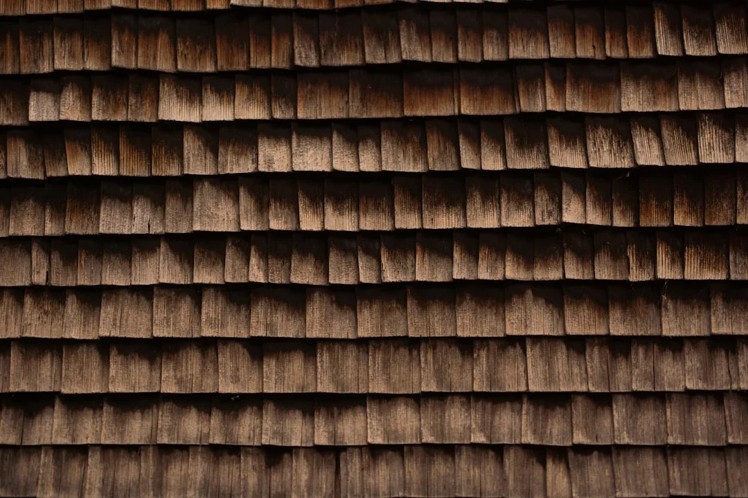 Wooden Shingles Roof Surface Wooden shingles cover a surface.