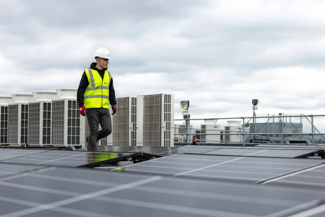 a man standing on top of a roof