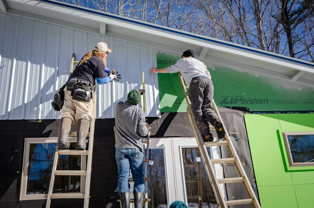 Zip System Sheathing Installation three person climbing on ladder