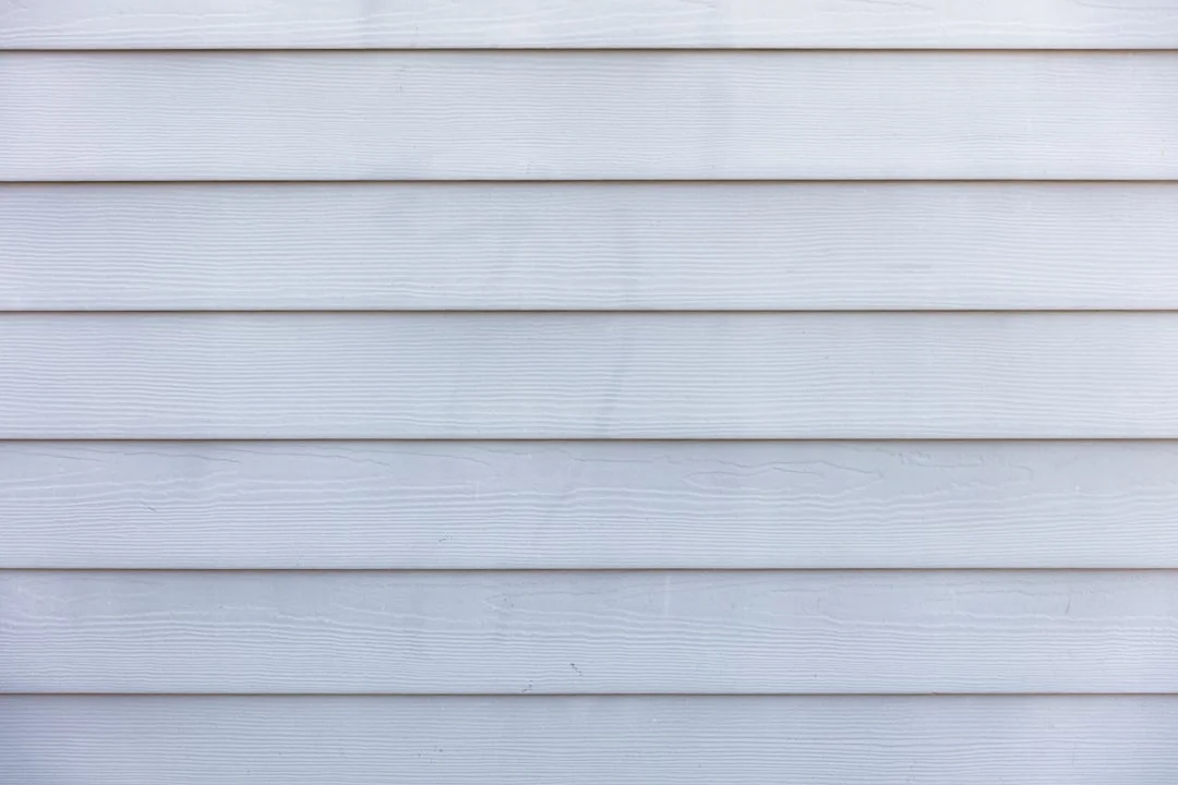 Wooden Siding Wall white wooden wall during daytime